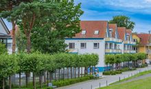 Sonnenblick Ferienhaus - Blick auf den gemütlichen Wohnbereich mit Kamonofen