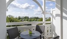 Balkon mit Sitzecke und Ausblick zum Selliner See