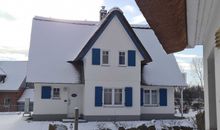 Winteridylle am E8 Reetdach Ferienhaus Strandvogel Ostseebad Rerik