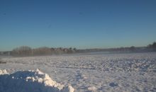 Blick auf die winterlichen Wiesen