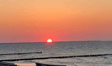 Strandmit Sonnenuntergang