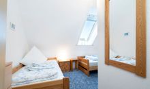 Schlafzimmer mit Doppelbett