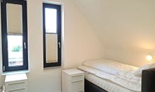 3.Schlafzimmer mit Einzelboxspringbetten im Dachgeschoss