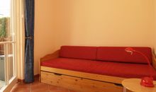 Das 2. Schlafzimmer mit einer Schlafcouch