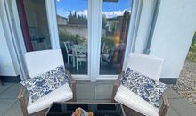 bestuhlte Terrasse vom Wohnzimmer begehbar