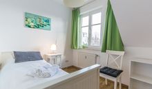 Das zweite Schlafzimmer mit ausziehbarem Kojenbett