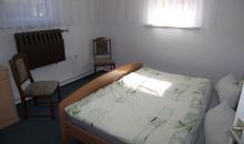 Schlafzimmer 1 mit Doppelbett