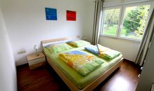 Schlafzimmer mit Doppelbett