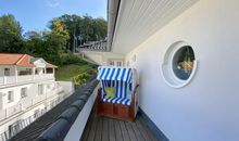 zweite bestuhlte Dachterrasse mit Strandkorb